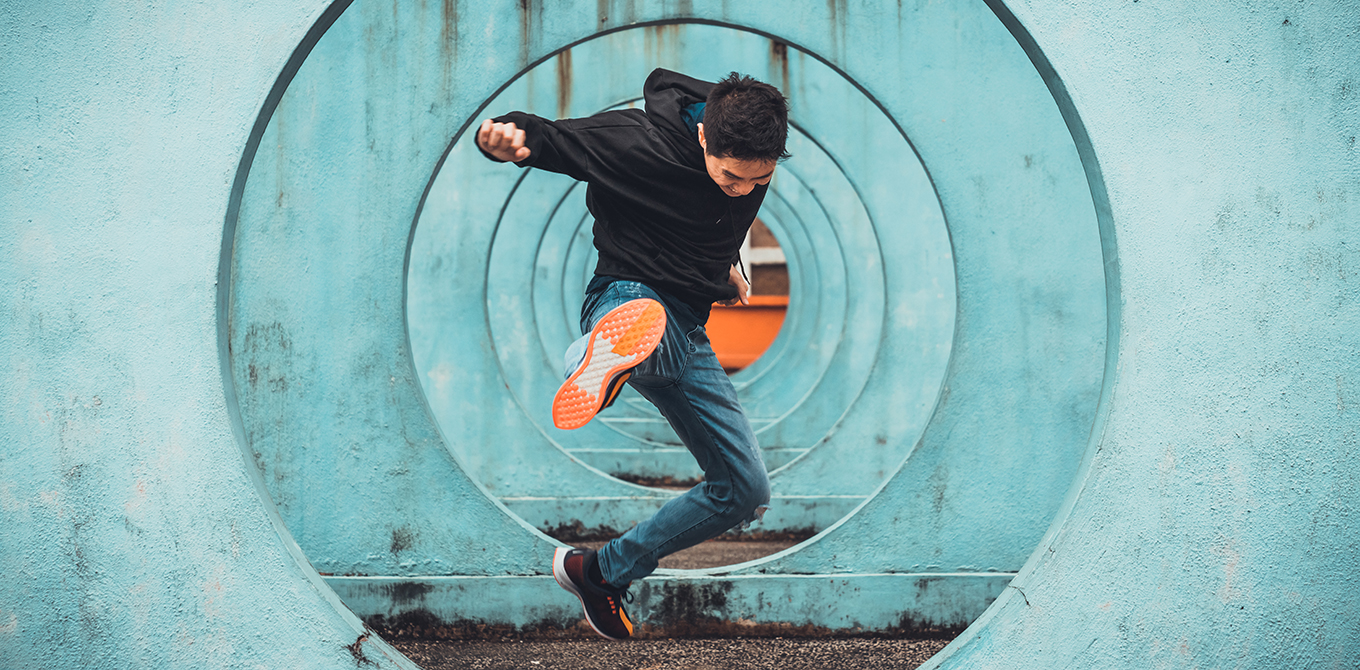 Guy high kicking